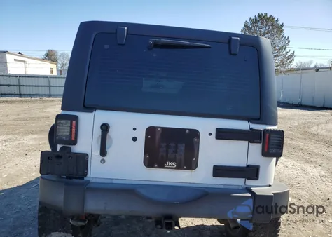 2013 Jeep Wrangler Unlimited Sport z USA, uszkodzony, nr VIN 1C4BJWDG4DL574217